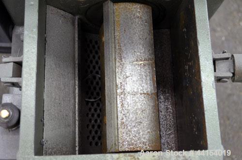 Used IMS Plastic Grinder, Model M-3, Carbon Steel. Approximate 6" diameter x 7" wide feed opening with a tilt back pelican feed hopper. (2) Bolt on blade closed rotor, approximate 3/16" diameter scre...