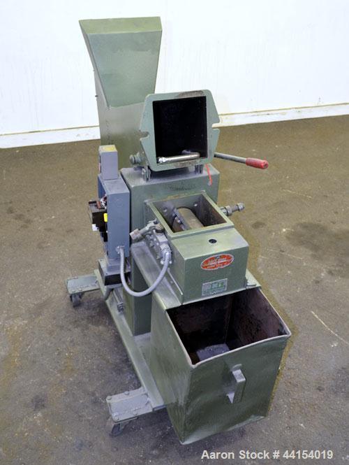 Used IMS Plastic Grinder, Model M-3, Carbon Steel. Approximate 6" diameter x 7" wide feed opening with a tilt back pelican feed hopper. (2) Bolt on blade closed rotor, approximate 3/16" diameter scre...
