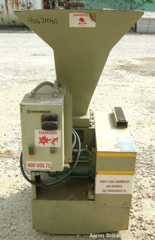 Used Conair/Wortex Granulator, model LP-330. Approximate 6" diameter x 7" wide segmented helical type rotor with 3 rows of 5 blades. 7 3/4" x 7 1/4" carbon steel chamber. 24" x 24" top feed opening. ...