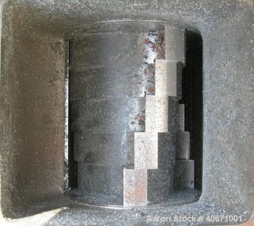 Used Conair/Wortex Granulator, model LP-330. Approximate 6" diameter x 7" wide segmented helical type rotor with 3 rows of 5 blades. 7 3/4" x 7 1/4" carbon steel chamber. 24" x 24" top feed opening. ...