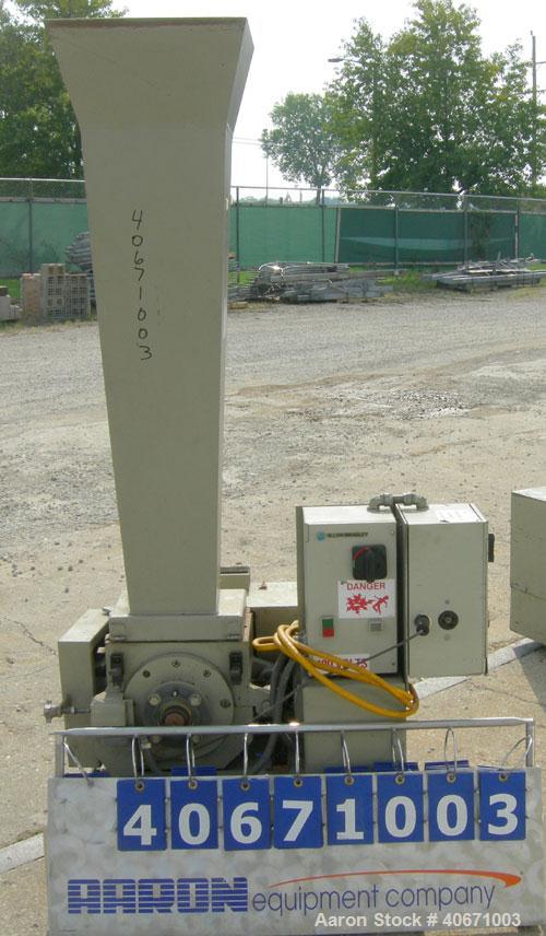 Used Conair/Wortex Granulator, model  LP-330.  Approximate 6" diameter x 7" long segmented helical type rotor with 3 rows of 5 blades.  7 3/4" x 7 1/4" carbon steel chamber.  16" x 16" top feed openi...