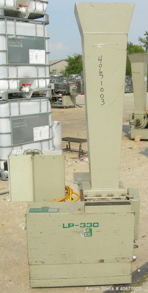 Used Conair/Wortex Granulator, model  LP-330.  Approximate 6" diameter x 7" long segmented helical type rotor with 3 rows of 5 blades.  7 3/4" x 7 1/4" carbon steel chamber.  16" x 16" top feed openi...