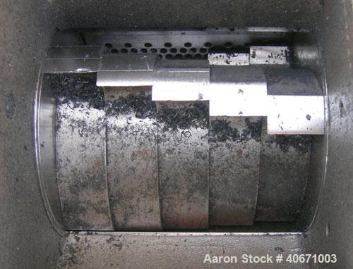 Used Conair/Wortex Granulator, model  LP-330.  Approximate 6" diameter x 7" long segmented helical type rotor with 3 rows of 5 blades.  7 3/4" x 7 1/4" carbon steel chamber.  16" x 16" top feed openi...