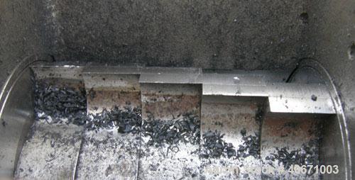 Used Conair/Wortex Granulator, model  LP-330.  Approximate 6" diameter x 7" long segmented helical type rotor with 3 rows of 5 blades.  7 3/4" x 7 1/4" carbon steel chamber.  16" x 16" top feed openi...