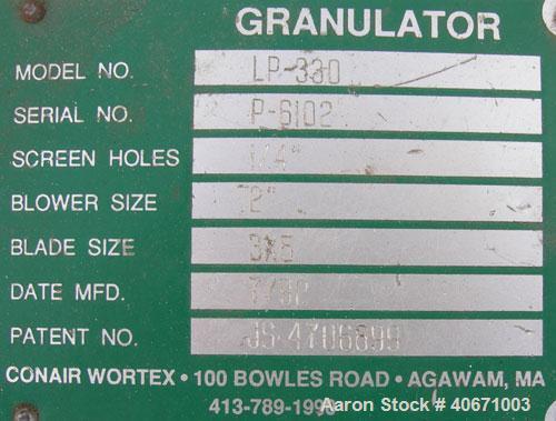 Used Conair/Wortex Granulator, model  LP-330.  Approximate 6" diameter x 7" long segmented helical type rotor with 3 rows of 5 blades.  7 3/4" x 7 1/4" carbon steel chamber.  16" x 16" top feed openi...