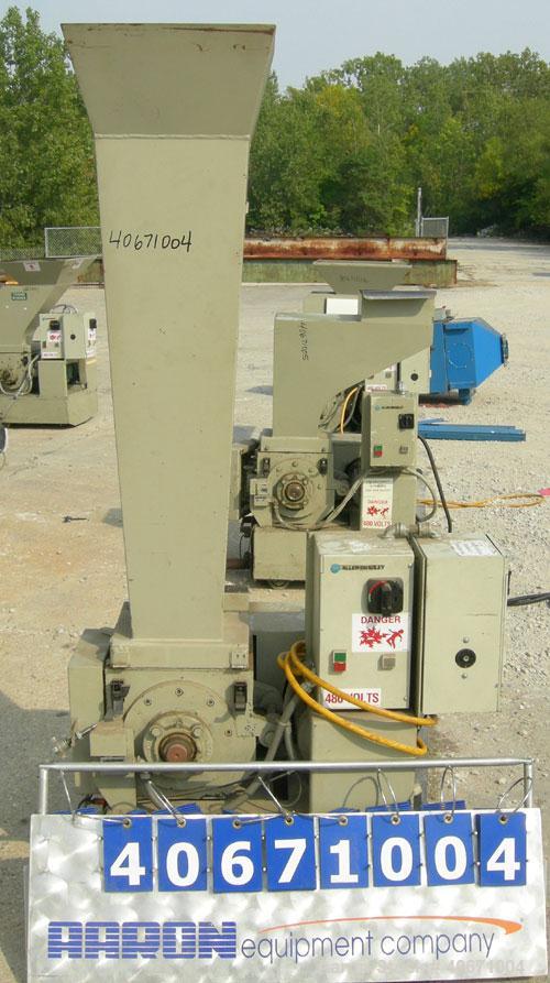 Used Conair/Wortex Granulator, model LP-330. Approximate 6" diameter x 7" long segmented helical type rotor with 3 rows of 5 blades. 7 3/4" x 7 1/4" carbon steel chamber. 16" x 24" top feed opening. ...