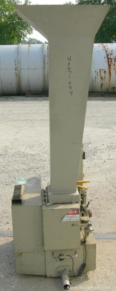 Used Conair/Wortex Granulator, model LP-330. Approximate 6" diameter x 7" long segmented helical type rotor with 3 rows of 5 blades. 7 3/4" x 7 1/4" carbon steel chamber. 16" x 24" top feed opening. ...