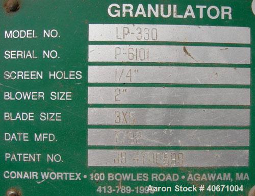 Used Conair/Wortex Granulator, model LP-330. Approximate 6" diameter x 7" long segmented helical type rotor with 3 rows of 5 blades. 7 3/4" x 7 1/4" carbon steel chamber. 16" x 24" top feed opening. ...