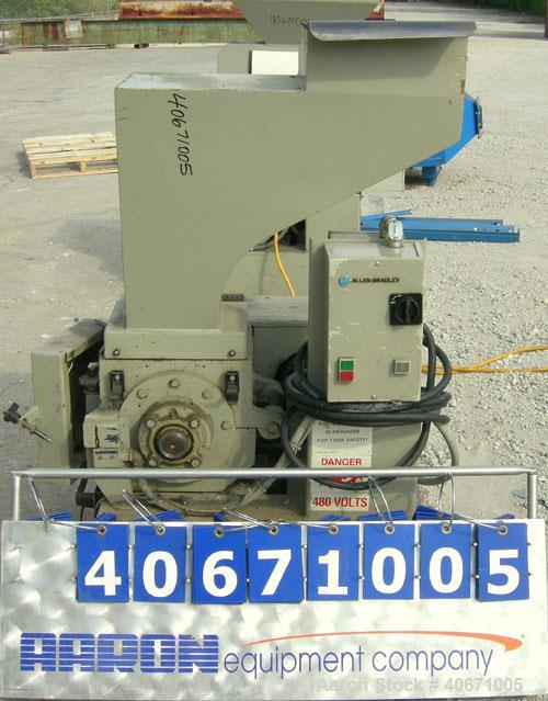 Used Conair/Wortex Granulator, model LP-330. Approximate 6" diameter x 7" long segmented helical type rotor with 3 rows of 5 blades. 7 3/4" x 7 1/4" carbon steel chamber. 12" x 12" top feed opening. ...