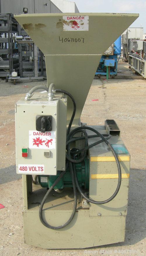 Used Conair/Wortex Granulator, model LP-330. Approximate 6" diameter x 7" long segmented helical type rotor with 3 rows of 5 blades. 7 3/4" x 7 1/4" carbon steel chamber. 24" x 24" top feed opening. ...
