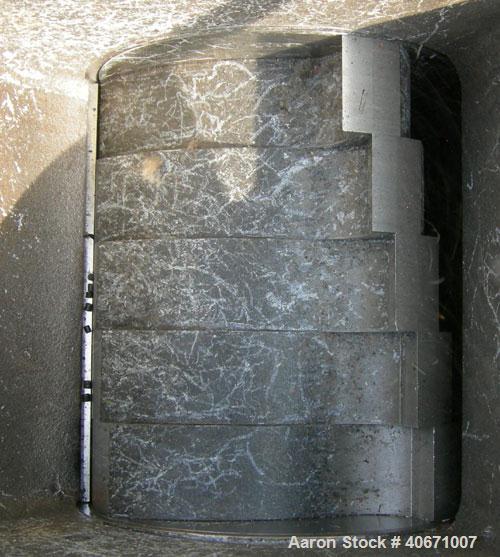 Used Conair/Wortex Granulator, model LP-330. Approximate 6" diameter x 7" long segmented helical type rotor with 3 rows of 5 blades. 7 3/4" x 7 1/4" carbon steel chamber. 24" x 24" top feed opening. ...