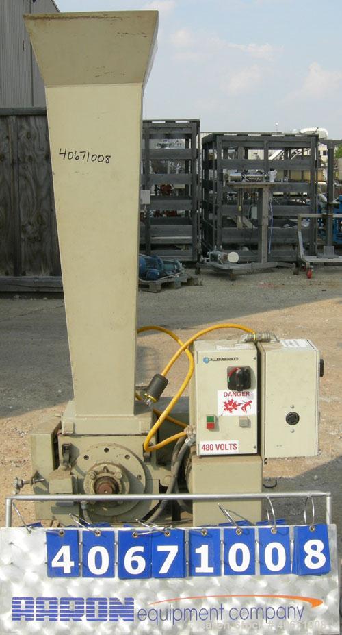 Used Conair/Wortex Granulator, model LP-330. Approximate 6" diameter x 7" long segmented helical type rotor with 3 rows of 5 blades. 7 3/4" x 7 1/4" carbon steel chamber. 16" x 24" top feed opening. ...