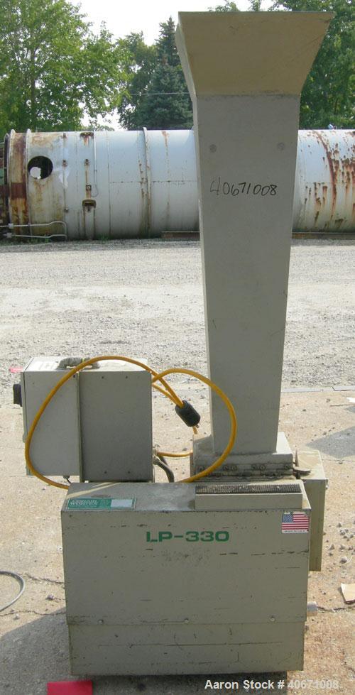 Used Conair/Wortex Granulator, model LP-330. Approximate 6" diameter x 7" long segmented helical type rotor with 3 rows of 5 blades. 7 3/4" x 7 1/4" carbon steel chamber. 16" x 24" top feed opening. ...