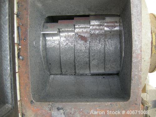 Used Conair/Wortex Granulator, model LP-330. Approximate 6" diameter x 7" long segmented helical type rotor with 3 rows of 5 blades. 7 3/4" x 7 1/4" carbon steel chamber. 16" x 24" top feed opening. ...