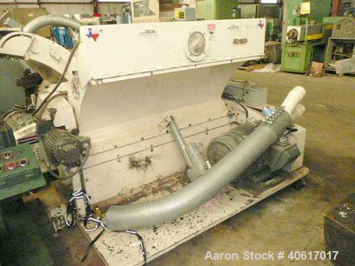 Used MPG Sheet Grinder, Model F56HB. Approximately 6" x 54" wide feed with motorized tilt hopper and pull rolls, driven by a 2 hp motor. Grinder driven by an approximate 50 hp motor. Mounted on caste...