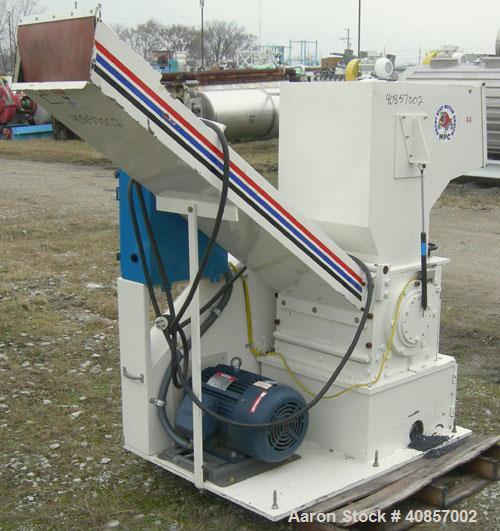 Used MPG Granulator, Model GP-1220HB. Approximately 10" diameter x 24" wide, 3 rows of 2 bolt on slanted blade open rotor. Tilt back pelican style feed hopper with sheet feed, set up for blower disch...