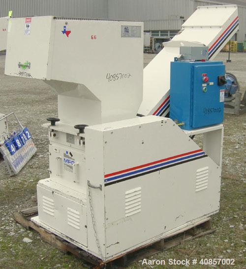 Used MPG Granulator, Model GP-1220HB. Approximately 10" diameter x 24" wide, 3 rows of 2 bolt on slanted blade open rotor. Tilt back pelican style feed hopper with sheet feed, set up for blower disch...