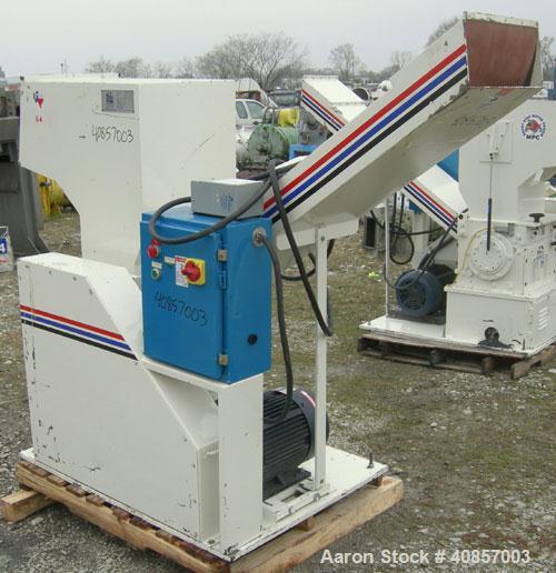 Used MPG Granulator, Model GP-1220HB. Approximately 10" diameter x 24" wide, 3 rows of 2 bolt on slanted blade open rotors. Tilt back pelican style feed hopper with sheet feed, set up for blower disc...