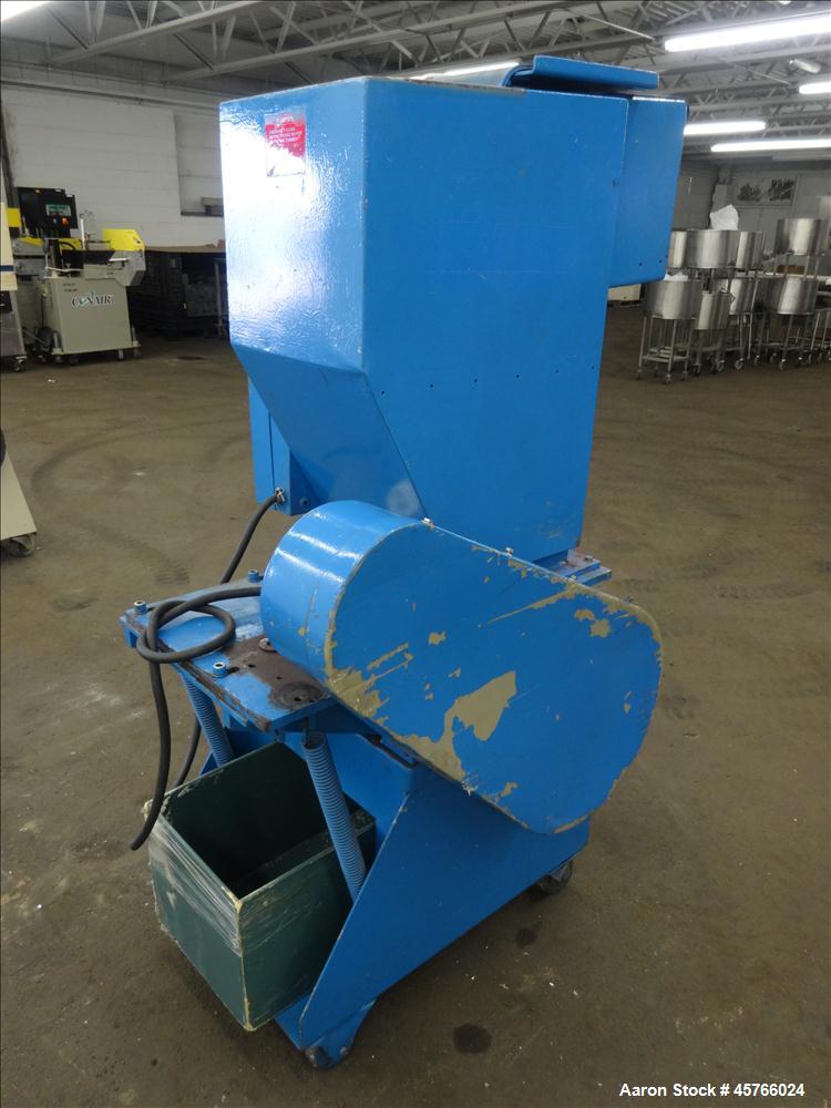 Used Nelmor Grinder, Model 1012RG11. Tilt back hopper. 13" Wide chamber with open rotor, 3 bolt on blades and 1/4" screen holes. Bottom discharge drawer. No motor. Serial#25924.