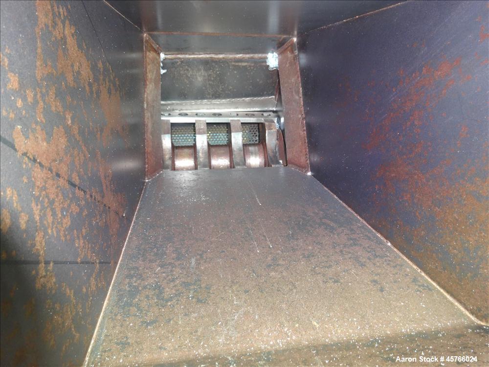 Used Nelmor Grinder, Model 1012RG11. Tilt back hopper. 13" Wide chamber with open rotor, 3 bolt on blades and 1/4" screen holes. Bottom discharge drawer. No motor. Serial#25924.