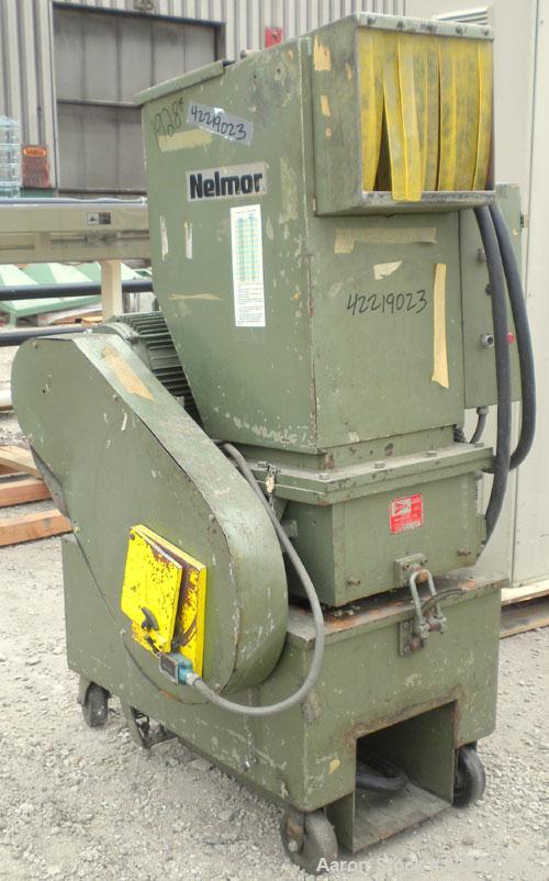 Used Nelmore Granulator, Model 1215M1. Approximately 12" diameter x 15" wide 3 bolt-on blade open rotor. Tilt back pelican style feed hopper, set up for bottom discharge, missing drawer. Approximatel...