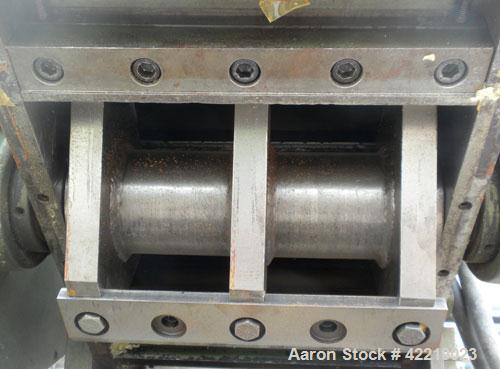 Used Nelmore Granulator, Model 1215M1. Approximately 12" diameter x 15" wide 3 bolt-on blade open rotor. Tilt back pelican style feed hopper, set up for bottom discharge, missing drawer. Approximatel...