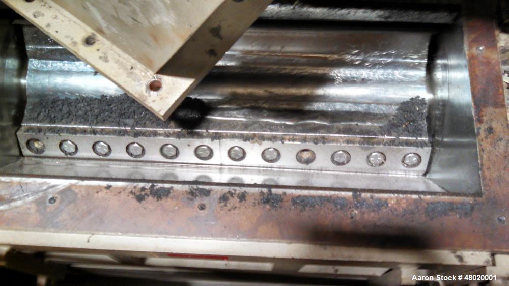 Used Nelmore Grinder, Model 1436. 75 hp, closed rotor, 6 blades rotating, 4 fixed bed knives. Also includes: 10 hp blower, cyclone with 8" inlet, Premier Air Loc, sound enclosure, Gaylord dumper, ste...