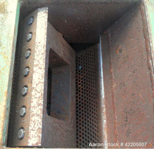 Used Nelmore Granulator, Model G1012M1. Approximately 10" diameter x 12" wide 2 bolt-on blade open rotor. Tilt back pelican style feed hopper, bottom discharge with drawer. Approximately 1/4" diamete...