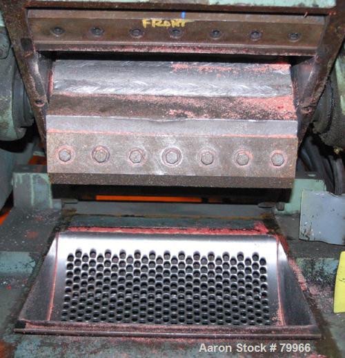 USED: Nelmor granulator, model G10121M1. 3 bolt-on blade closedrotor, 2 bed knives, pelican style feed with a 12" wide x 10" tallfeed opening, 1/4" screen holes, pull out discharge drawer, drivenby a...