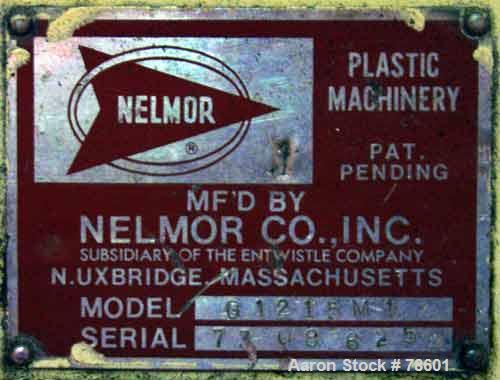 USED:Nelmor grinder, model G1215MI, 2 bolt-on knives, open rotor,approx 1/4" screen holes, pelican style feed, bottom discharge,driven by a 15 hp, 3/60/230/460 volt, 1755 rpm motor. Mounted oncasters...