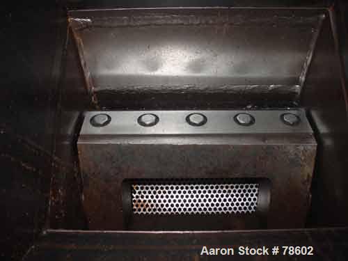 USED:Nelmor grinder, model G1215MI, 2 bolt-on knives, open rotor,approx 1/4" screen holes, pelican style feed, bottom discharge,driven by a 15 hp, 3/60/230/460 volt, 1755 rpm motor. Mounted oncasters...