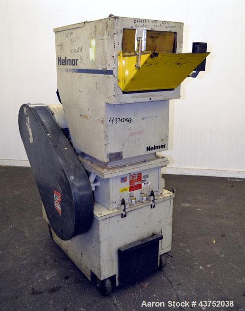 Used Nelmore Granulator, Model G1215P1. Approximately 12" diameter x 15" wide 3 bolt-on blade closed rotor. Tilt back pelican style feed hopper, set up for bottom discharge with drawer. Approximately...