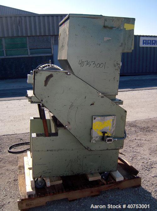 Used Nelmore Granulator, Model G1220M1. Approximately 12" diameter x 19 1/2" wide 3 bolt-on blade open rotor. Tilt back pelican style feed hopper, set up for bottom blower discharge. Approximately 3/...