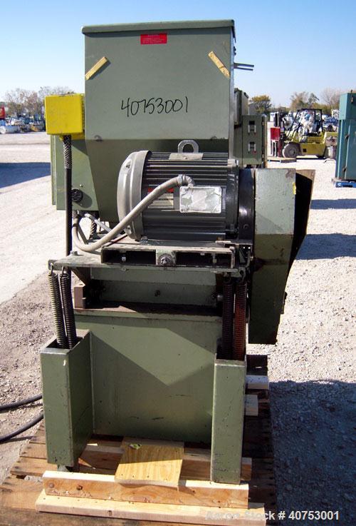 Used Nelmore Granulator, Model G1220M1. Approximately 12" diameter x 19 1/2" wide 3 bolt-on blade open rotor. Tilt back pelican style feed hopper, set up for bottom blower discharge. Approximately 3/...