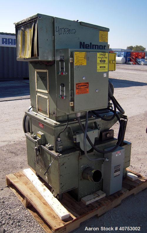 Used Nelmore Granulator, Model G1220M1. Approximately 12" diameter x 19 1/2" wide 3 bolt-on blade open rotor. Tilt back pelican style feed hopper, set up for bottom blower discharge. Approximately 3/...