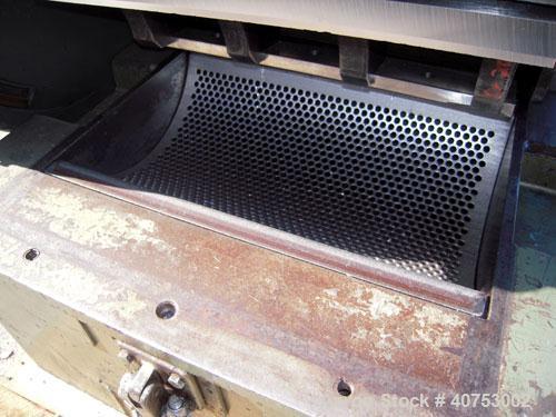 Used Nelmore Granulator, Model G1220M1. Approximately 12" diameter x 19 1/2" wide 3 bolt-on blade open rotor. Tilt back pelican style feed hopper, set up for bottom blower discharge. Approximately 3/...