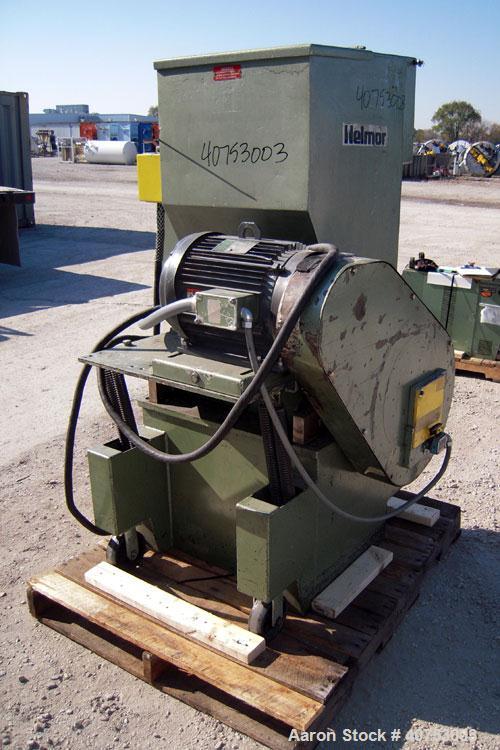Used Nelmore Granulator, Model G1220M1. Approximately 12" diameter x 19 1/2" wide 3 bolt-on blade open rotor. Tilt back pelican style feed hopper, set up for bottom blower discharge. Approximately 3/...