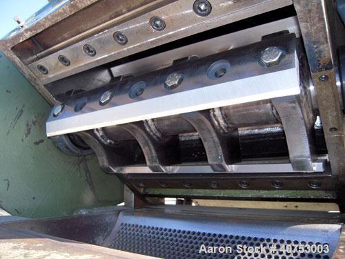 Used Nelmore Granulator, Model G1220M1. Approximately 12" diameter x 19 1/2" wide 3 bolt-on blade open rotor. Tilt back pelican style feed hopper, set up for bottom blower discharge. Approximately 3/...