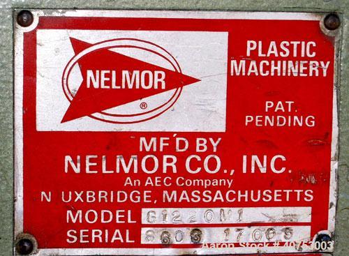 Used Nelmore Granulator, Model G1220M1. Approximately 12" diameter x 19 1/2" wide 3 bolt-on blade open rotor. Tilt back pelican style feed hopper, set up for bottom blower discharge. Approximately 3/...