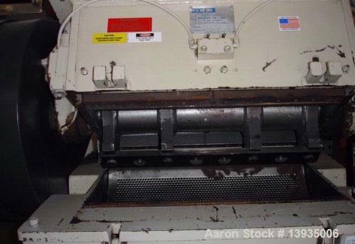 Used 1997 Nelmore Model G1224P1. Throat opening size 12" x 24", 3 blade open rotor, 2 bed knives, bottom cast bin, 20 hp.