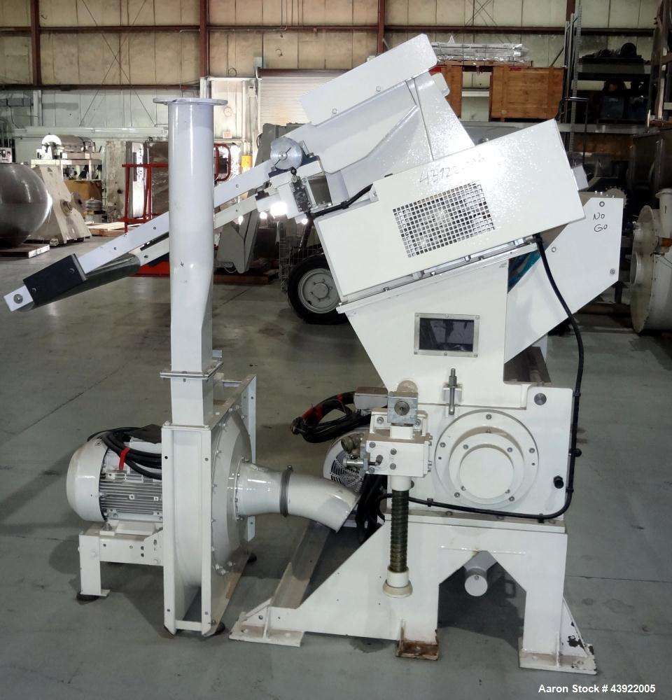 Used OMV (TRIA) Granulator, Built 2004. Model TR900. Approximate 12" diameter x 38" wide two roll feed. Driven by a 1.1 KW Drive. Rolls are grooved. Grinder has (4) knives, with open style rotor. Eac...