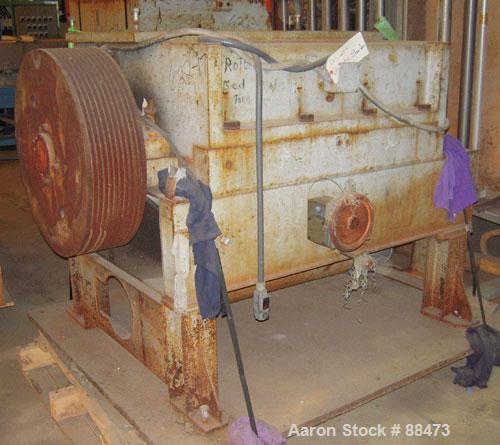 Used Polymer Machinery Granulator, Model 2040. 3-knife open rotor. 20" x 40" feed throat with hopper. Requires an approximate 150 hp motor. Mounted on legs with a base.
