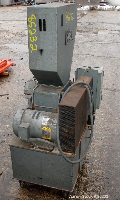 USED: Polymer Machinery Corp Grinder, model 68SPL. Approximate 6" diameter x 8" wide 2 bolt-on blade open rotor, no blades. Tilt back pelican style feed hopper, bottom discharge drawer. Approximately...