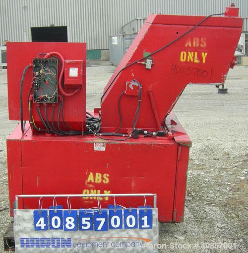 Used Rapid Granulator, Model 1224K. Approximately 12" diameter x 24" wide, 3 rows of 2 bolt on slanted blade open rotors. Tilt back pelican style feed hopper, set up for blower discharge with bottom ...