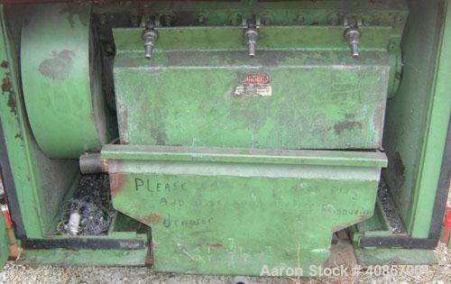 Used Rapid Granulator, Model 1224K. Approximately 12" diameter x 24" wide, 3 rows of 2 bolt on slanted blade open rotors. Tilt back pelican style feed hopper, set up for blower discharge with bottom ...