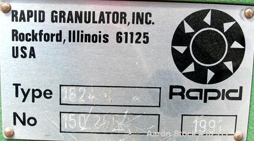 USED: Rapid granulator, model 1824K. Approx 18" diameter x 24" wide open rotor with 3 rows of 2 bolt on blades. Tilt back pelican style feed hopper, set up for blower discharge. Driven by an approx 2...