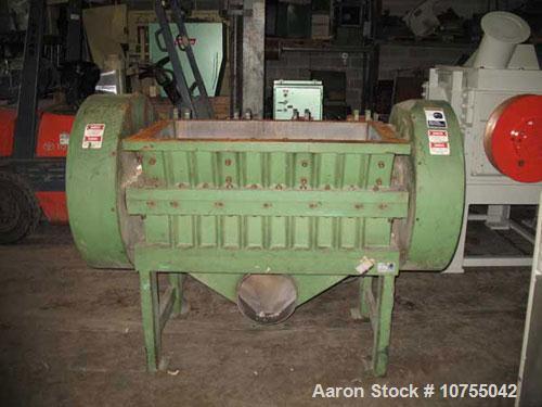 Used Rapid Model 2442H Granulator. 24" x 42" cutting chamber dimension. Conveyor infeed with pneumatic tilt back assist. Unit equipped with 5 knife open rotor. Dual flywheel, D2 bed knives with optio...