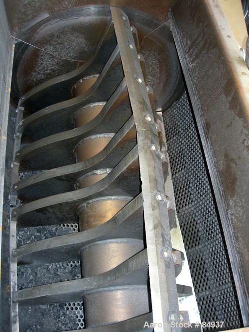 USED: Rotogran granulator, 48" x 28" feed opening with bolt-on hopper. Approx 48" wide, 3 rows of 2 bolt-on slanted blades, open rotor, bottom blower discharge. Approx 3/4" screen holes. Driven by a ...