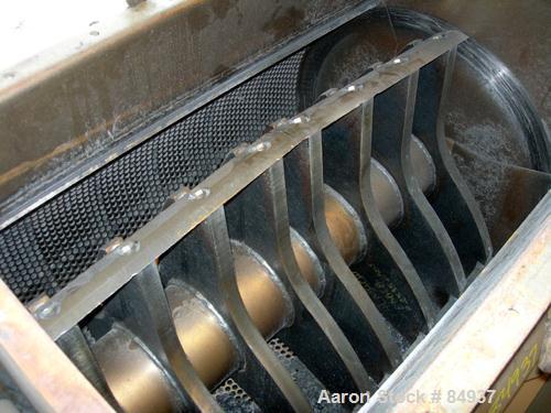 USED: Rotogran granulator, 48" x 28" feed opening with bolt-on hopper. Approx 48" wide, 3 rows of 2 bolt-on slanted blades, open rotor, bottom blower discharge. Approx 3/4" screen holes. Driven by a ...