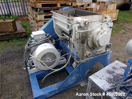 Used Tria Granulator, Type 80-49/DN-SL, Carbon Steel. Approximate 15.6" diameter x 24.9" wide (400mm x 830 mm) rotor, (5) rotor knives, (2) bed knives. Driven by a 55kw (82.5hp), 3/50/400/690 volt, 1...